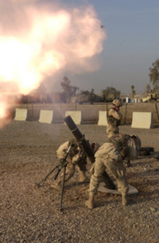 U.S. Army soldiers fire 120mm mortars to calibrate the systems at Forward Operation Base Marez in Mosul, Iraq, on Dec. 14, 2004. The soldiers are assigned to 1st Battalion, 24th Infantry Regiment, 1st Brigade, 25th Infantry Division Stryker Brigade Combat Team. 