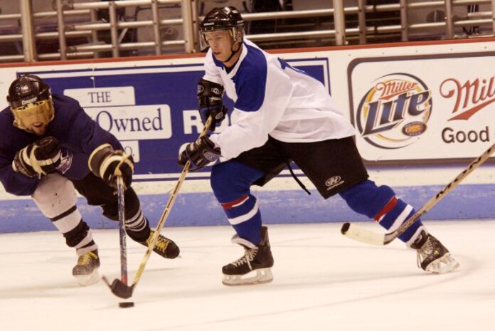 CHARLESTON, S.C. -- Russ Killpartrick skates into the Navy's zone and scores the first goal of the game for the Air Force hockey team from nearby Charleston Air Force Base.  The Airmen defeated the Navy team 6-5.  (U.S. Air Force photo by Staff Sgt. Ricky A. Bloom)