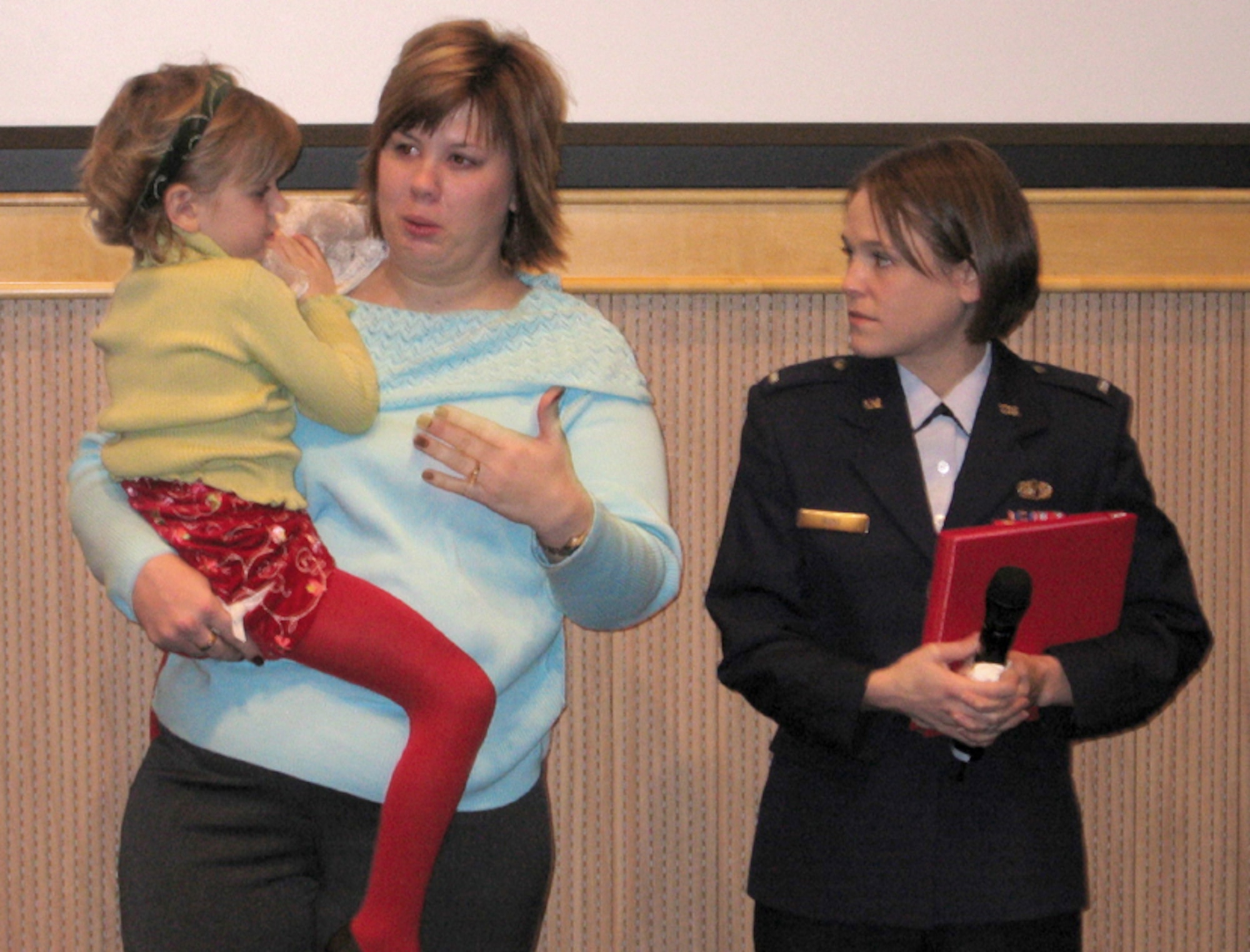 WASHINGTON -- First Lt. Janelle Rust (right) meets Rilee Bjerke and her mother, Nicole, during a bone marrow conference here.  Lieutenant Rust donated bone marrow to the girl when she was 3 years old.  The Airman is a missile officer assigned to the 12th Missile Squadron at Malmstrom Air Force Base, Mont. (Courtesy photo)
