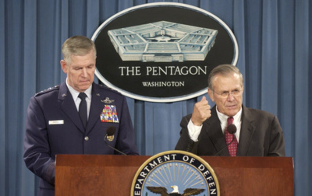 Secretary of Defense Donald H. Rumsfeld answers a reporter's question concerning the December 21st explosion in the dining facility at Forward Operating Base Marez in southwest Mosul, Iraq, during a Dec. 22, 2004, press briefing in the Pentagon. Rumsfeld and Chairman of the Joint Chiefs of Staff Gen. Richard B. Myers, U.S. Air Force, briefed reporters on the attack. Officials are still investigating the cause of the explosion, but preliminary evidence indicates that it could be the work of a suicide bomber. 