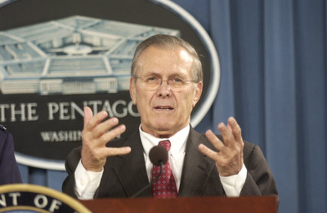 Secretary of Defense Donald H. Rumsfeld answers a reporter's question concerning the December 21st explosion in the dining facility at Forward Operating Base Marez in southwest Mosul, Iraq, during a Dec. 22, 2004, press briefing in the Pentagon. Rumsfeld and Chairman of the Joint Chiefs of Staff Gen. Richard B. Myers, U.S. Air Force, briefed reporters on the attack. Officials are still investigating the cause of the explosion, but preliminary evidence indicates that it could be the work of a suicide bomber. 