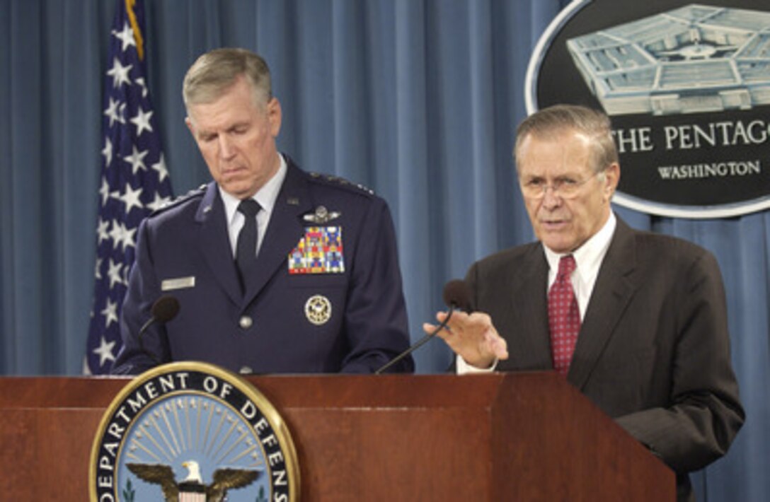 Secretary of Defense Donald H. Rumsfeld and Chairman of the Joint Chiefs of Staff Gen. Richard B. Myers, U.S. Air Force, brief reporters in the Pentagon on the December 21st explosion in the dining facility at Forward Operating Base Marez in southwest Mosul, Iraq, on Dec. 22, 2004. Officials are still investigating the cause of the explosion, but preliminary evidence indicates that it could be the work of a suicide bomber. 