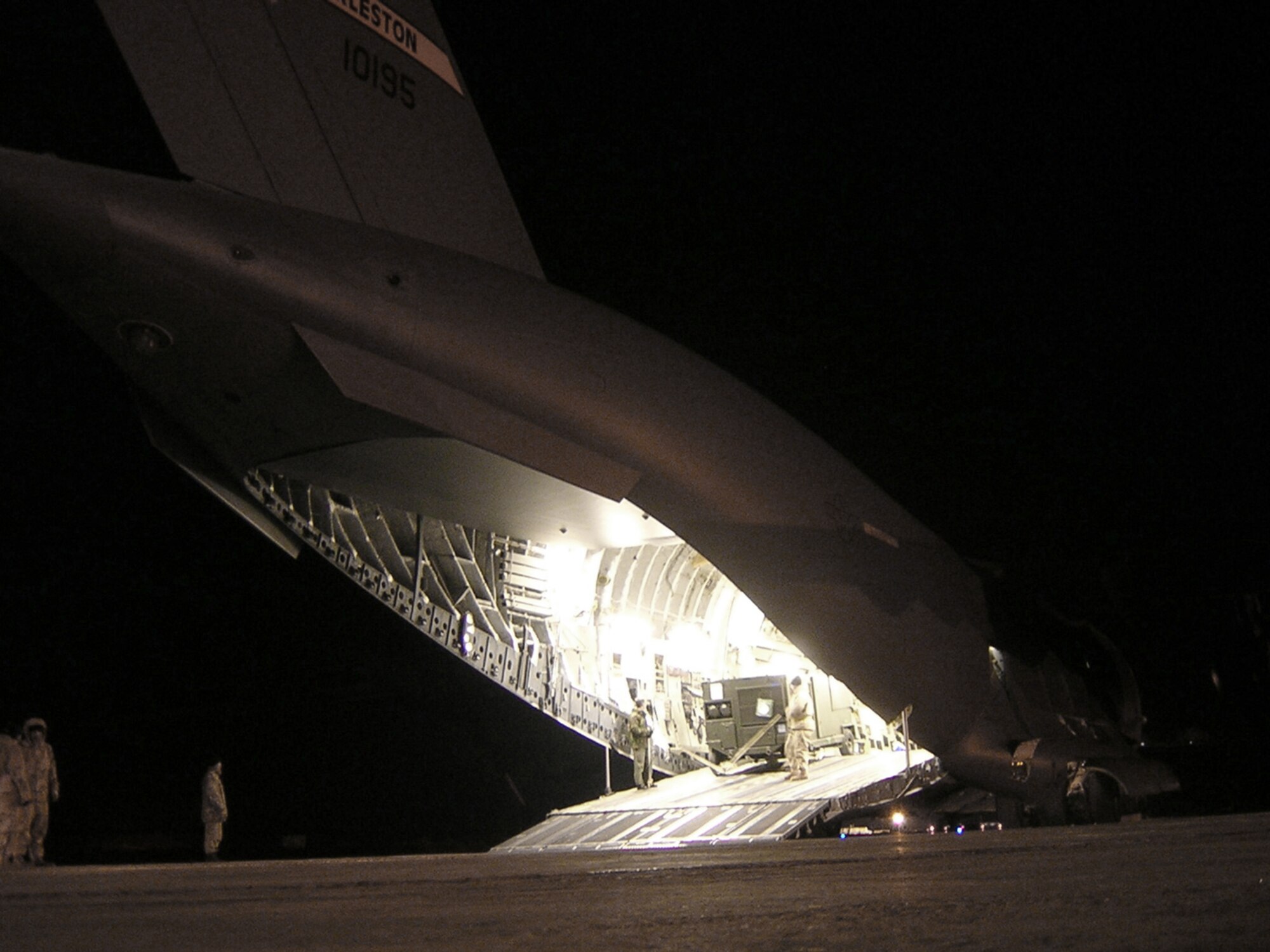 KARSHI-KHANABAD AIRFIELD, Uzbekistan -- The 416th Air Expeditionary Group's aerial port flight here loads equipment for transport to forward-deployed locations.  The aerial port team is deployed from the Nevada Air National Guard's 152nd Airlift Wing and supporting Operation Enduring Freedom.  (U.S. Air Force photo by Col. Tim Vining)