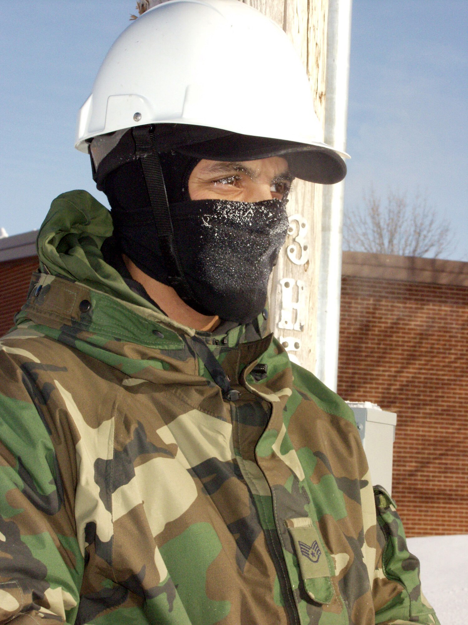 GRAND FORKS AIR FORCE BASE, N.D. -- Staff Sgt. Ramon Padilla and his co-workers have worked outdoors in temperatures that have reached minus 30 since mid-January here.  Sergeant Padilla works in the 319th Civil Engineer Squadron exterior electrical shop.  (U.S. Air Force photo by Airman Patrice Clarke)
