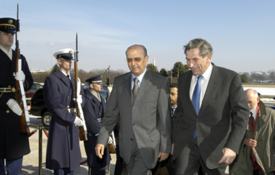 Yemen's Minister of Foreign Affairs Abu Bakr al-Qirbi (left) arrives at the Pentagon on Feb. 4, 2004, for talks with Deputy Secretary of Defense Paul Wolfowitz (right). A variety of security issues, including the global war on terrorism, will be on the table for discussion. 