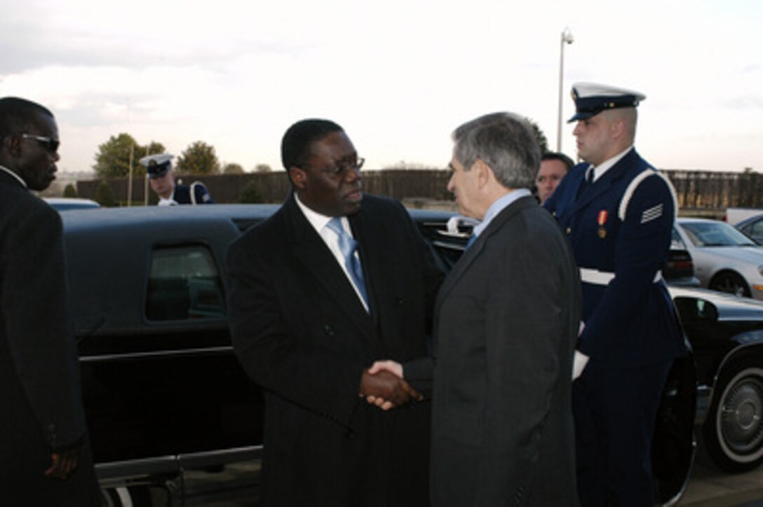 Deputy Secretary of Defense Paul Wolfowitz greets Liberian Chairman Gyude Bryant (left) at the Pentagon on Feb. 10, 2004. The two leaders will meet to discuss defense issues of mutual interest. 