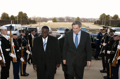 Deputy Secretary Wolfowitz escorts Liberian Chairman Gyude Bryant into