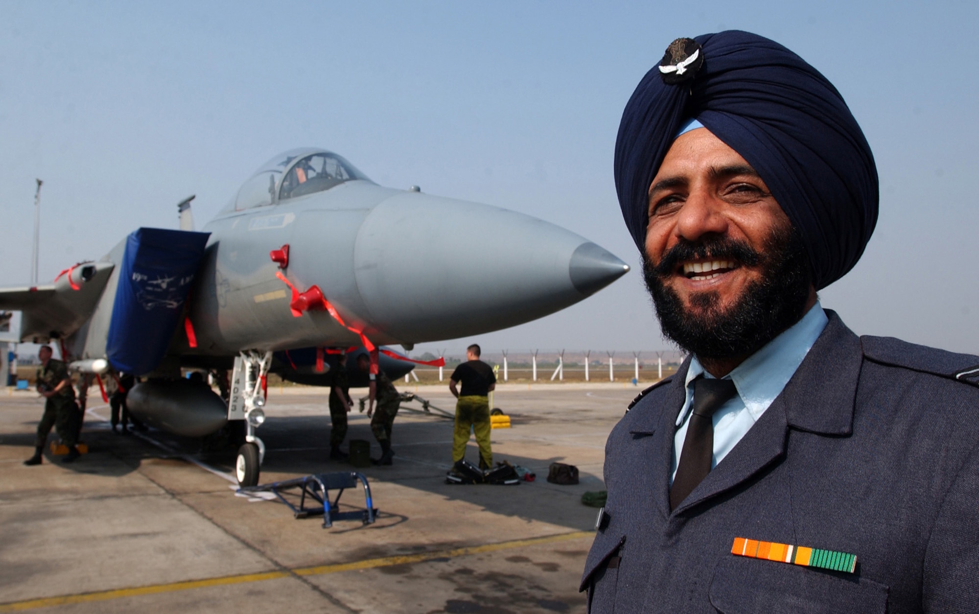 GWALIOR AIR FORCE STATION, India (AFPN) -- Indian air force Squadron Leader Ajmer Singh Hundal was on hand for the arrival of the first two F-15 Eagle aircraft here Feb. 14.  The aircraft and approximately 150 airmen from Elmendorf Air Force Base, Alaska, are participating in Cope India 04, an exercise which runs through Feb. 25.  (U.S. Air Force photo by Tech Sgt. Keith Brown)