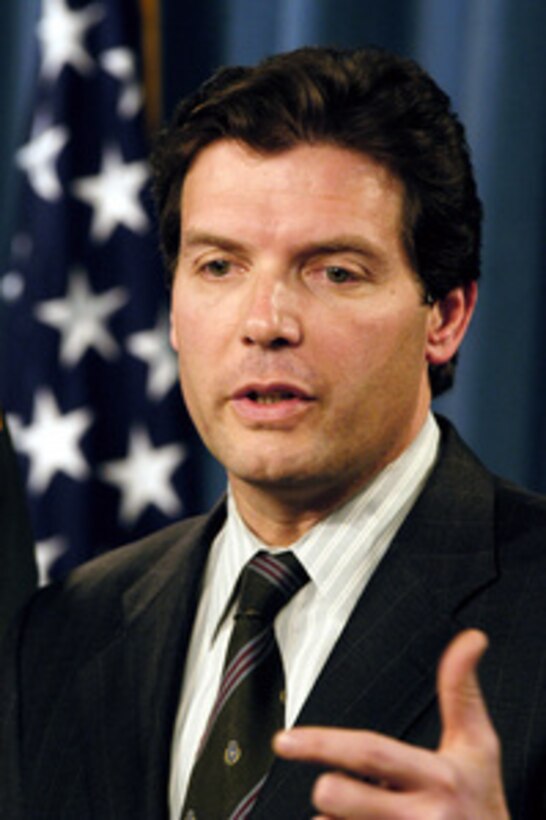 Principal Deputy Assistant Secretary of Defense for Public Affairs Lawrence Di Rita gestures as he responds to a reporter's question during a Pentagon press briefing on Feb. 19, 2004. 