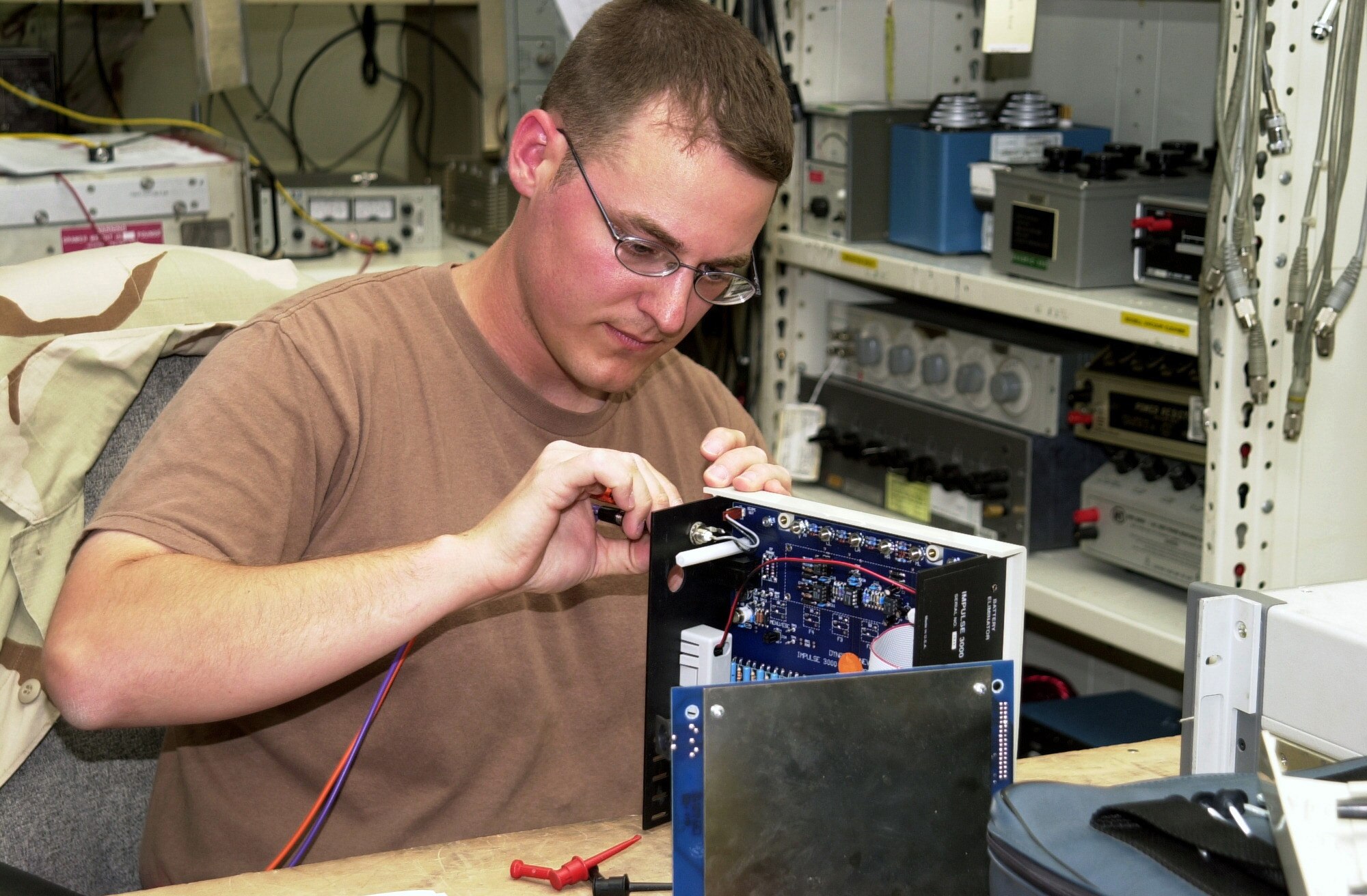 SOUTHWEST ASIA -- Staff Sgt. Matthew Koch performs a load and resistance calibration on a defibrillator analyzer.  Hospitals use defibrillator analyzers to verify proper operation of their defibrillators, which are used to stabilize patients who have an abnormal heart rate.  Sergeant Koch is a precision measurement equipment laboratory technician with the 379th Expeditionary Maintenance Squadron and is deployed from Shaw Air Force Base, S.C.  (U.S. Air Force photo by Senior Airman Chawntain Young)