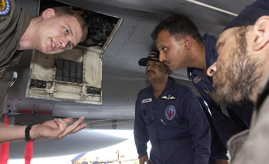 GWALIOR AIR FORCE STATION, India -- Capt.  David Skalicky gives a tour of an F-15 Eagle to Indian air force officers here after the day's flying for Cope India '04, a bilateral fighter exercise between Indian and U.S. air forces.  Captain Skalicky is a pilot from Elmendorf Air Force Base, Alaska.  (U.S. Air Force photo by Tech. Sgt. Keith Brown)