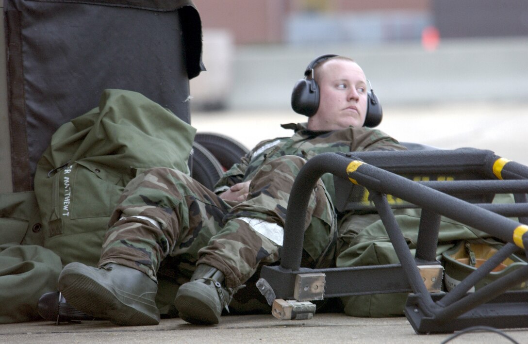 LANGLEY AIR FORCE BASE, Va. -- Airman 1st Class Andrew Lederer takes a break during an exercise here, Feb. 24.  Airman Lederer is an electrician specialist from the 27th Fighter Squadron here. (U.S. Air Force photo by Staff Sgt. Dawn M. Bolen)