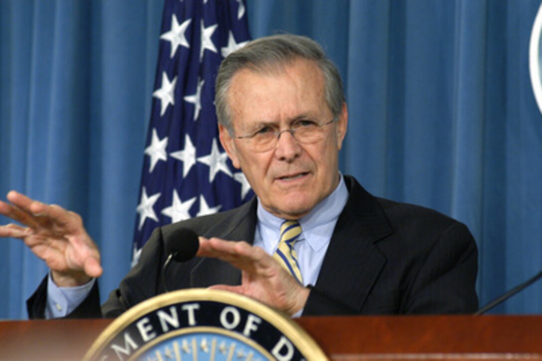 Secretary of Defense Donald H. Rumsfeld responds to reporter's question during a press briefing in the Pentagon on Jan. 6, 2004. 