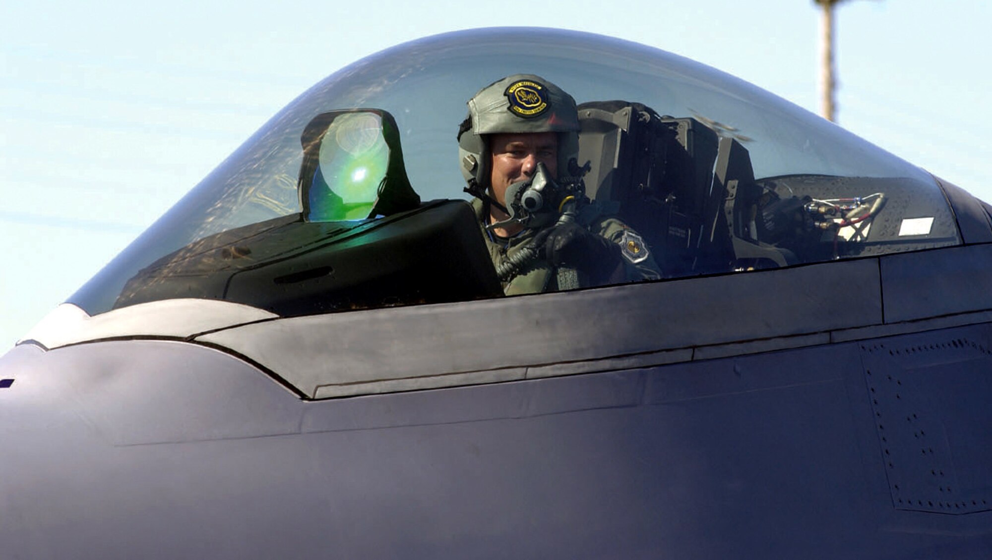 TYNDALL AIR FORCE BASE, Fla. - Maj. Michael Hoepfner completes his checkout flight in Raptor No. 18 recently as the first local F/A-22 fighter pilot to finish his training here.  (U.S. Air Force photo by Lisa Carroll)
