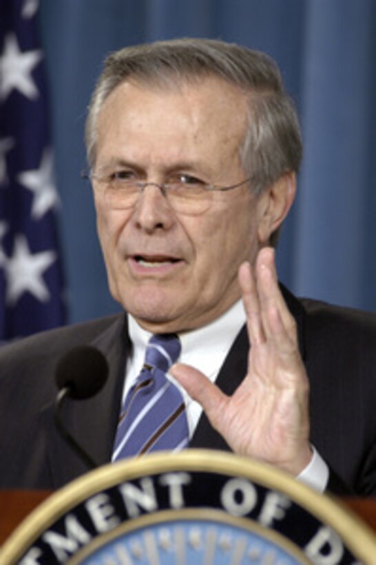 Secretary of Defense Donald H. Rumsfeld responds to a reporter's question concerning a recently published book about the Bush administration during a press briefing on Jan 13, 2004. 