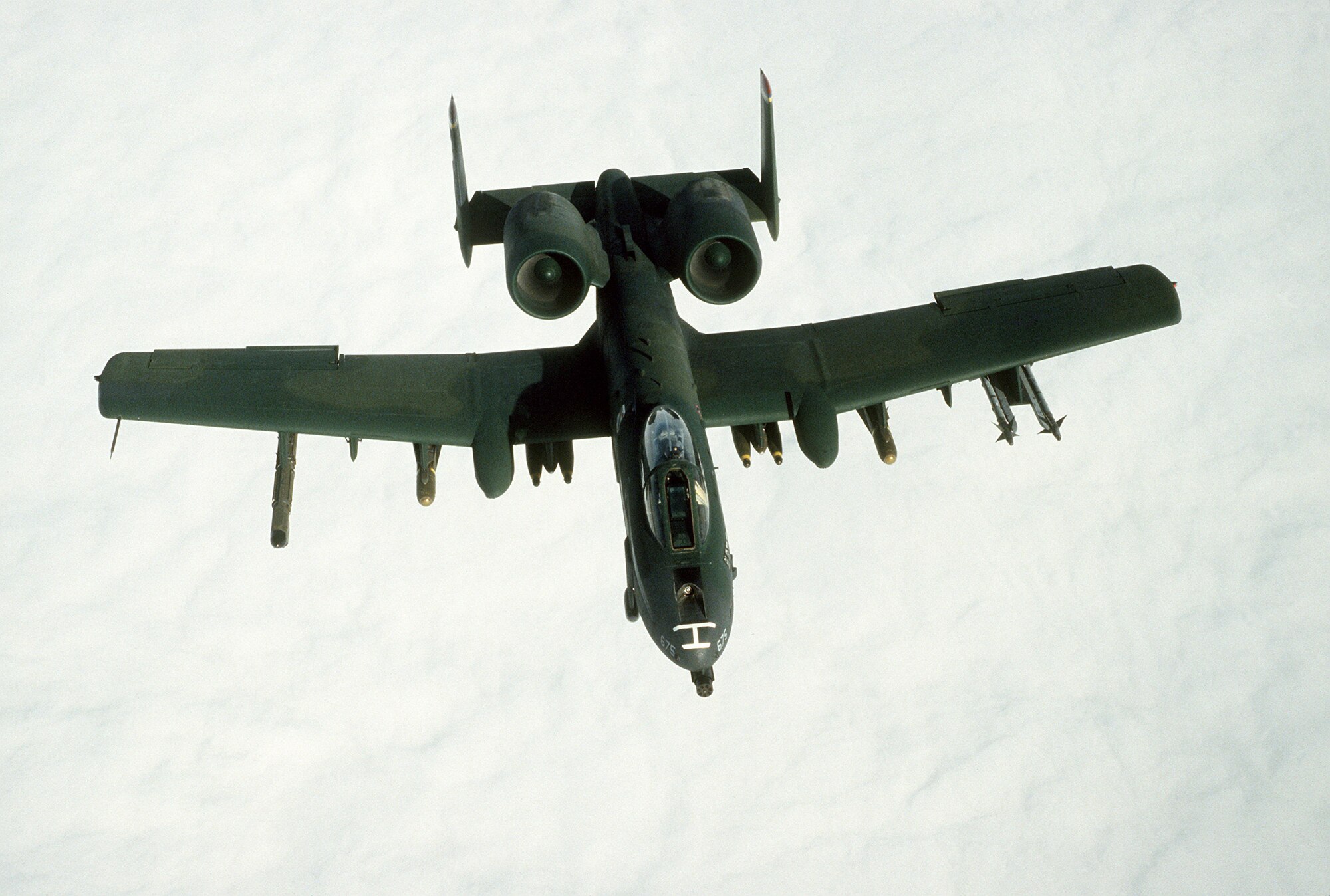 1990's -- An A-10A Thunderbolt II aircraft takes part in a mission during Operation Desert Storm.   The aircraft is armed with AIM-9 Sidewinder missiles, AGM-65 Maverick missiles, and Mark 82 500-pound bombs.  