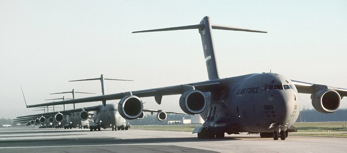 In a classic "Moose Walk", a C-17 from the 437th Airlift Wing lines up on the taxiway at Charleston Air Force Base, before taking to the air for a nine-ship, close-formation airdrop.  (U.S. Air Force photo by Tech. Sgt. Cary Humphries)  (Released)