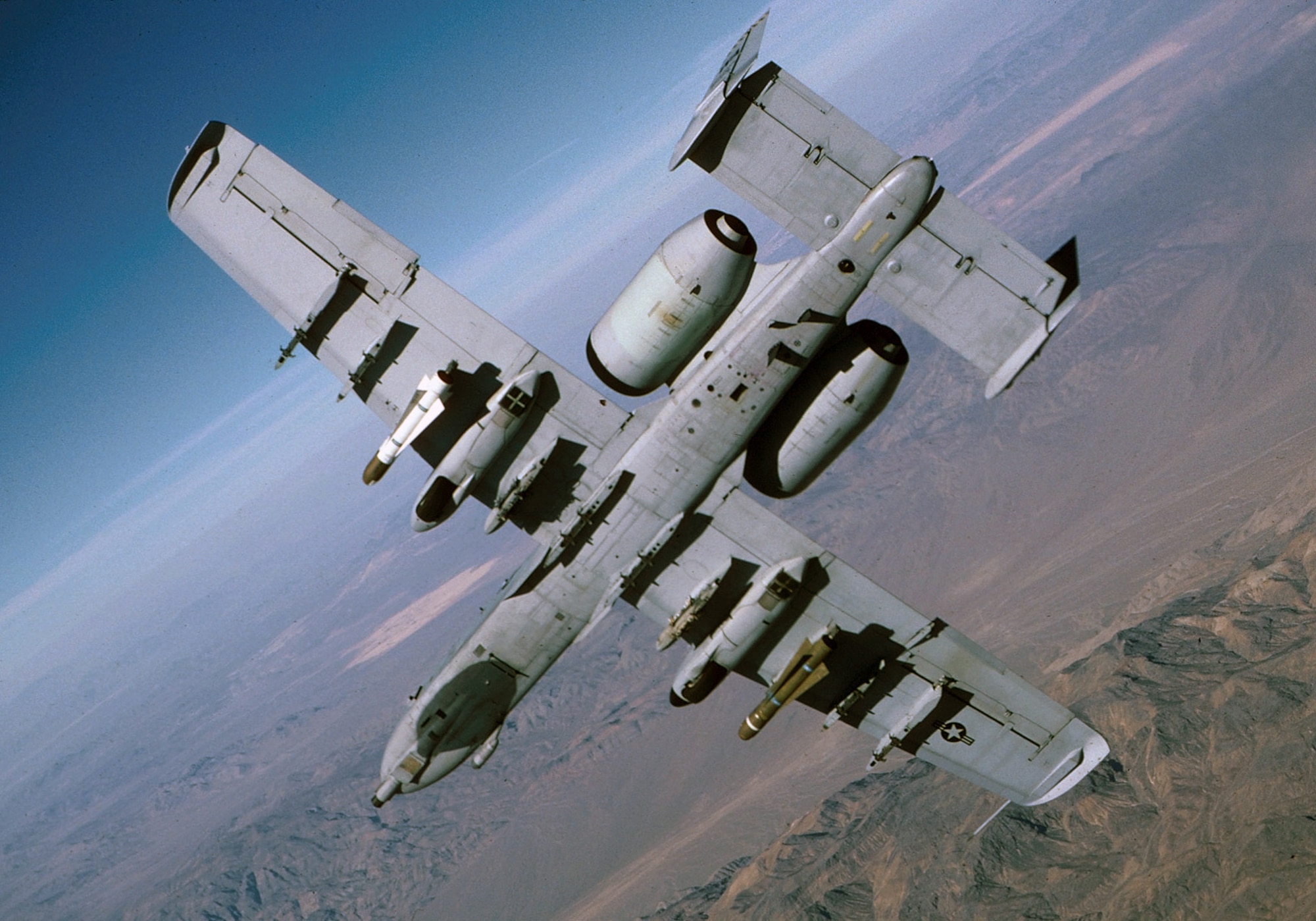 The A-10 and OA-10 Thunderbolt IIs are the first Air Force aircraft specially designed for close air support of ground forces. They are simple, effective and survivable twin-engine jet aircraft that can be used against all ground targets, including tanks and other armored vehicles. The A-10/OA-10 have excellent maneuverability at low air speeds and altitude, and are highly accurate weapons-delivery platforms. They can loiter near battle areas for extended periods of time and operate under 1,000-foot ceilings (303.3 meters) with 1.5-mile (2.4 kilometers) visibility. Their wide combat radius and short takeoff and landing capability permit operations in and out of locations near front lines. Using night vision goggles, A-10/ OA-10 pilots can conduct their missions during darkness. (U.S. Air Force Photo Staff Sgt. Steve Thurow)