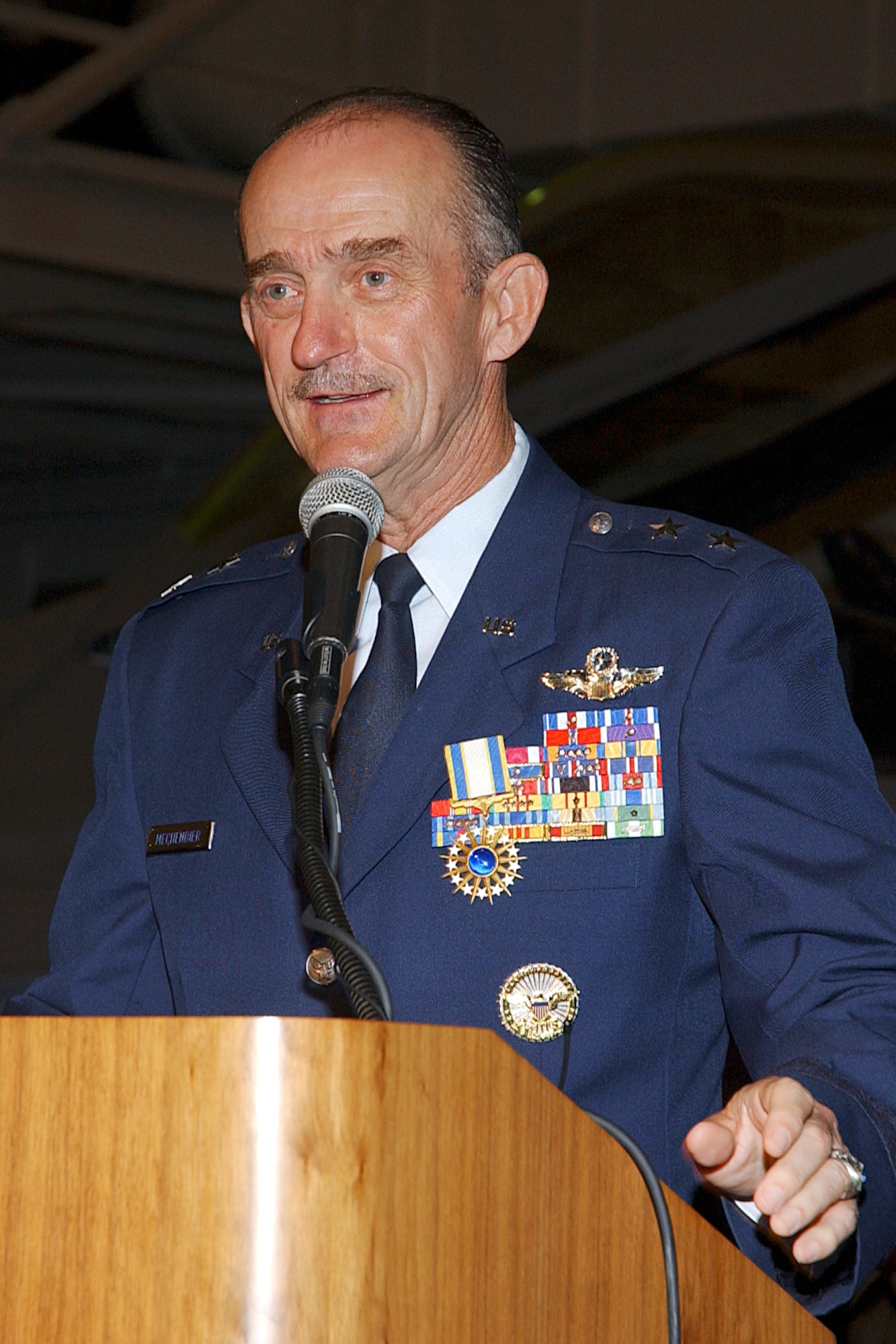 WRIGHT-PATTERSON AIR FORCE BASE, Ohio -- Reserve Maj. Gen. Ed Mechenbier speaks to the crowd during his retirement ceremony here June 30.  The general had more than four decades of active-duty, Guard and Reserve service.  (U.S. Air Force photo by Larry Davenport)