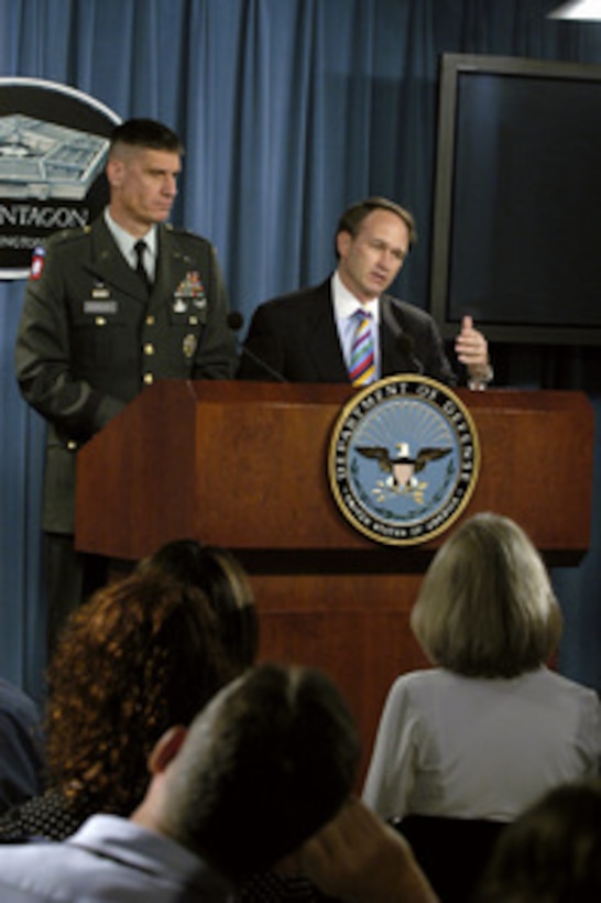 Assistant Secretary of Defense for Health Affairs William Winkenwerder Jr. announces that the anthrax and smallpox vaccination programs would include selected units within the U.S. Pacific Command, additional personnel now serving with the U.S. Central Command and selected other groups of individuals on June 30, 2004. Winkenwerder was joined by Joint Staff Deputy Director of Operations Brig. Gen. David Rodriguez, U.S. Army. 