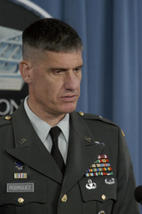 Joint Staff Deputy Director of Operations Brig. Gen. David Rodriguez, U.S. Army, responds to a reporter's question during a Pentagon briefing on June 30, 2004. Rodriguez and Assistant Secretary of Defense for Health Affairs William Winkenwerder Jr. announced that the anthrax and smallpox vaccination programs would include selected units within the U.S. Pacific Command, additional personnel now serving with the U.S. Central Command and selected other groups of individuals. 