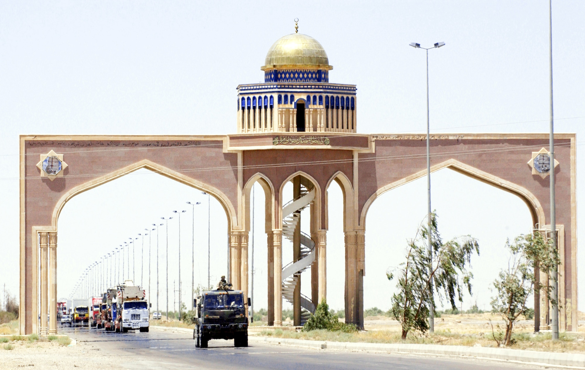 IRAQ -- A gun truck from the 2632nd Air Expeditionary Force Transportation Company leads a convoy on the main supply route from Baghdad to Tikrit.  The company's Airmen provide security to military and civilian convoys as they move supplies to multiple forward-deployed locations throughout Iraq.  (U.S. Air Force photo by Tech. Sgt. Scott Reed)