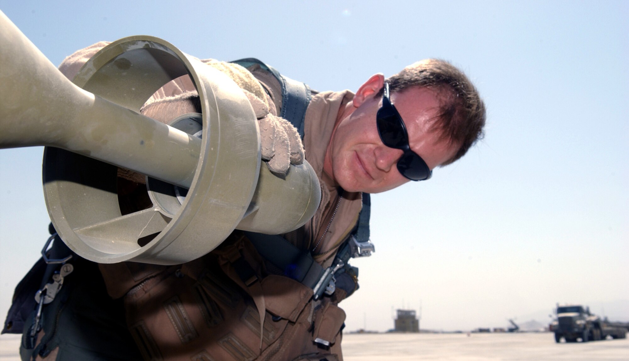BAGRAM AIR BASE, Afghanistan -- Capt. Steve checks the guidance system on a 500-pound laser-guided bomb during a preflight inspection.  (His last name is omitted for security reasons.)  Captain Steve is an A-10 Thunderbolt II pilot assigned to the 355th Expeditionary Fighter Squadron here.  (U.S. Air Force photo by Master Sgt. Andrew Gates)