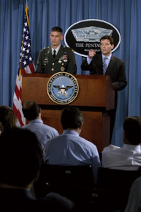 Principal Deputy Assistant Secretary of Defense for Public Affairs Lawrence Di Rita calls on a reporter during a Pentagon press briefing on July 14, 2004. Di Rita is accompanied by Deputy Director of Operations for the Joint Staff Brig. Gen. David Rodriguez, U.S. Army. 