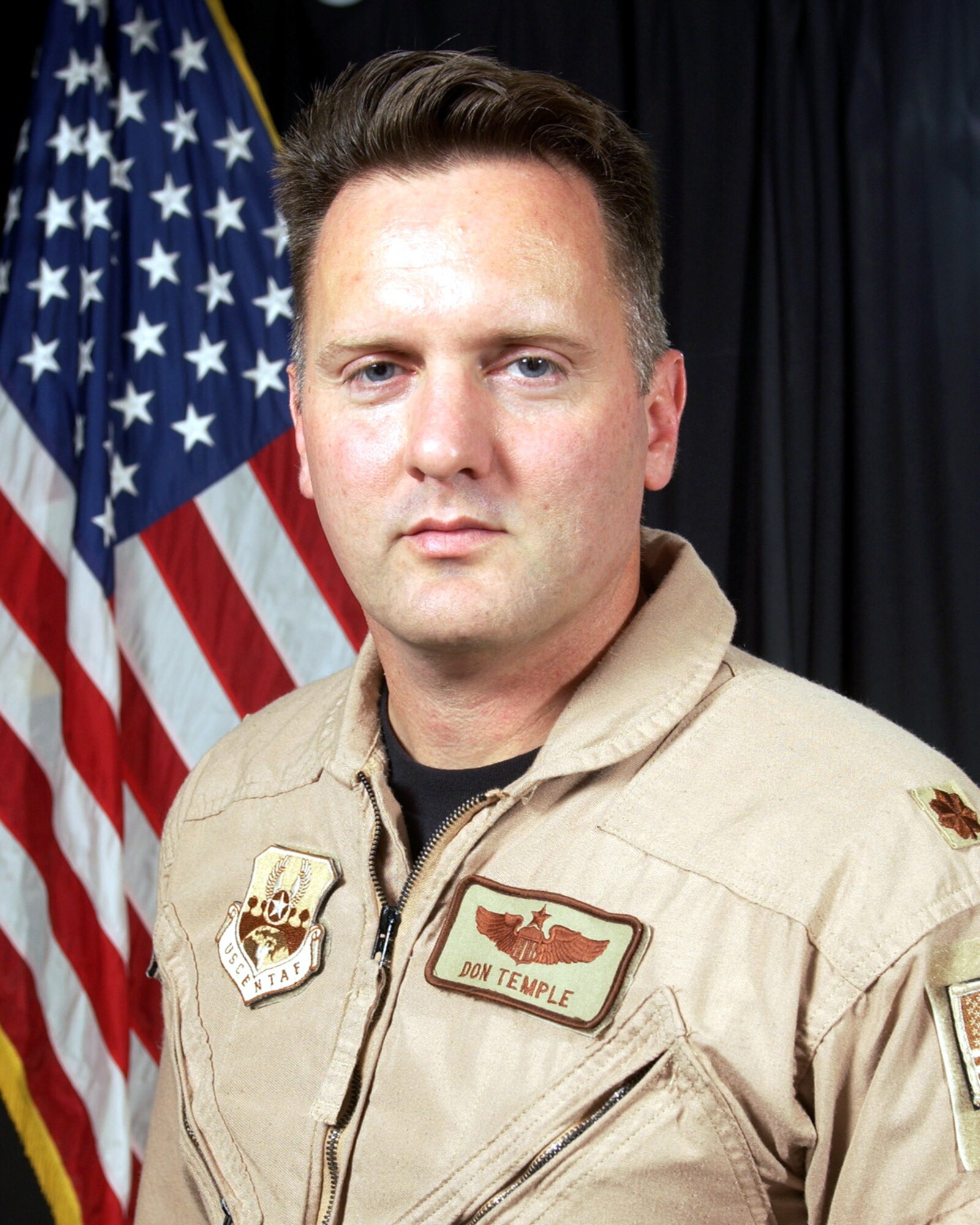 SOUTHWEST ASIA -- Maj. Donald Temple discovered he was not an American citizen when he applied for a passport before deploying.  He is a U-2 pilot assigned to the 99th Expeditionary Reconnaissance Squadron and deployed from Beale Air Force Base, Calif.  (Courtesy photo)