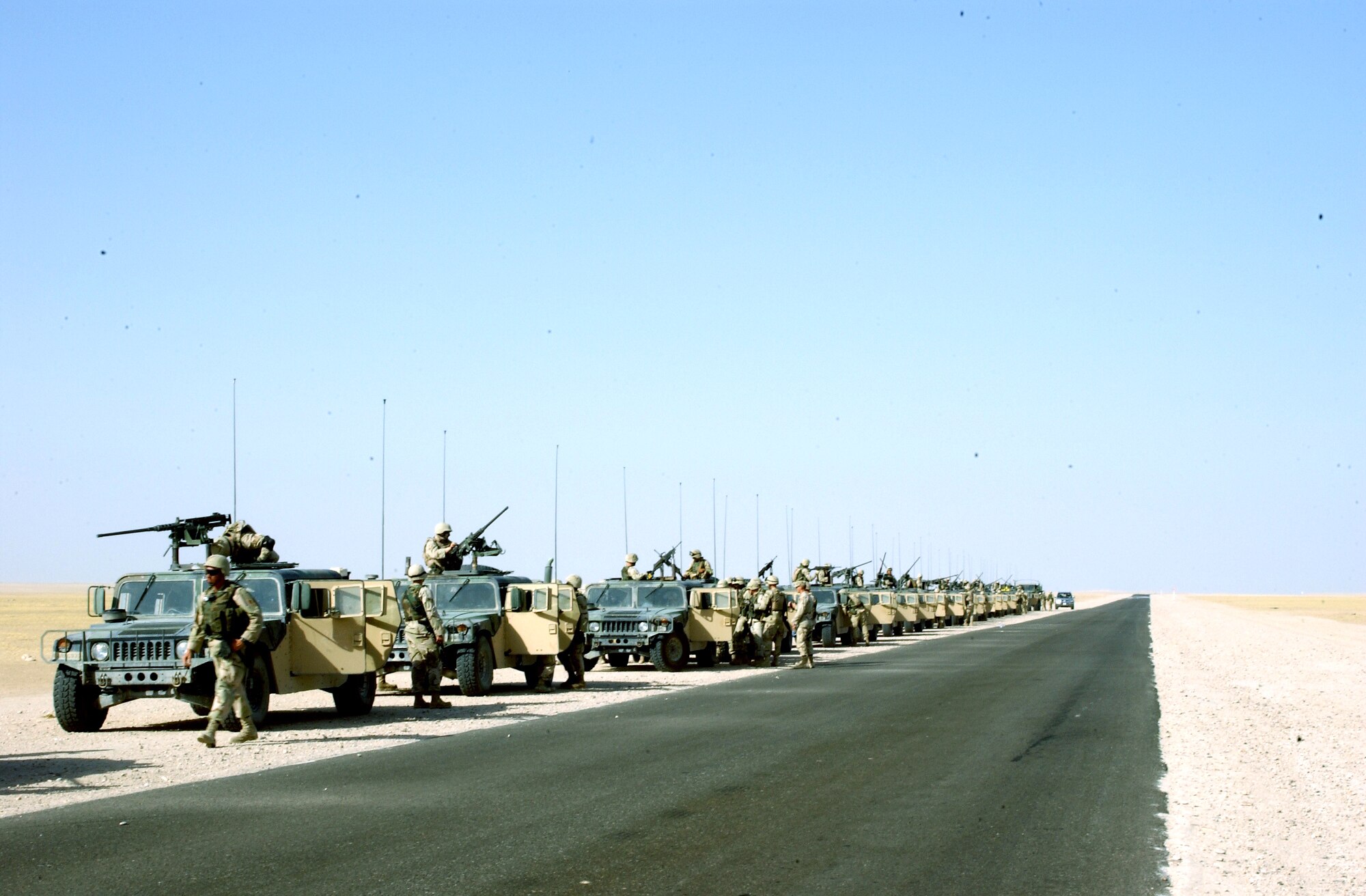 SOUTHWEST ASIA -- A convoy prepares to go on a training mission July 15.  More than 150 Airmen participated in the training exercise designed to prepare them for upcoming missions.  The Airmen completed the final stages of live-fire convoy training at Balad Air Base, Iraq, on July 16 before deploying north to Mosul as part of the 494th Air Expeditionary Force Truck Company.  (U.S. Air Force photo by Airman 1st Class Heather Norris)