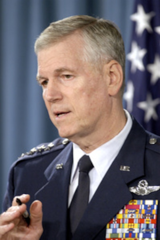 Chairman of the Joint Chiefs of Staff Gen. Richard B. Myers, U.S. Air Force, responds to a reporter's question during a July 21, 2004, press briefing in the Pentagon. 