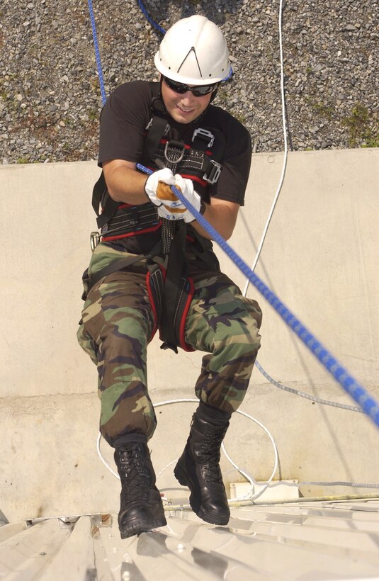 SAVANNAH, Ga. -- A firefighter with the West Virginia Air National Guard's 130th Airlift Wing rappels down a wall here during annual training July 17. (U.S. Air Force photo by Staff Sgt. Bryan G. Stevens)