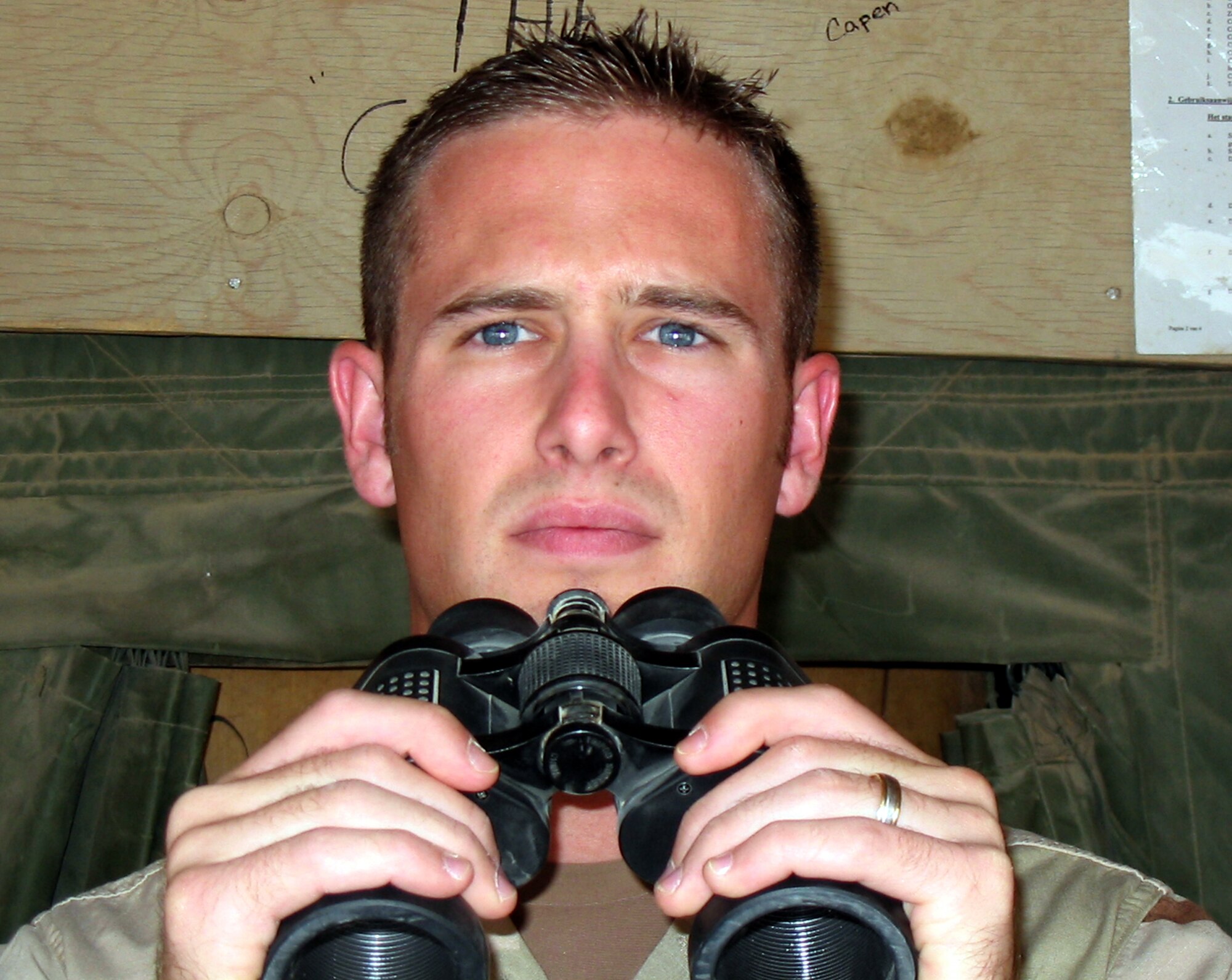 TALLIL AIR BASE, Iraq -- Staff Sgt. Rocky Johnston watches for incoming helicopters needing fuel.  Sergeant Johnston is one of 16 Airmen assigned to the U.S. Army's 439th Petroleum, Oil and Lubricant Forward-Area Refueling Point here.  (U.S. Air Force photo by Airman 1st Class Ryan Bigelow)