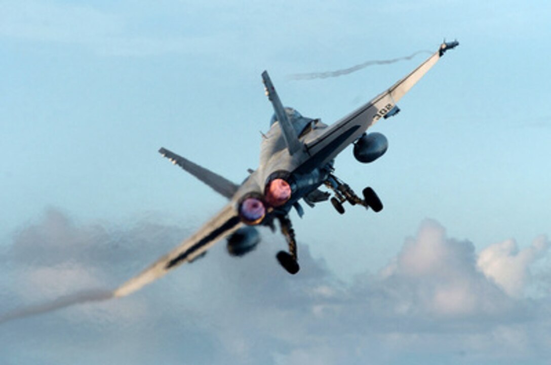 A U.S. Navy F/A-18C Hornet launches from the flight deck of the USS John C. Stennis (CVN 74) on a scheduled mission of exercise Rim of the Pacific '04 in the Pacific Ocean, on July 18, 2004. Exercise Rim of the Pacific '04 is an international maritime exercise designed to enhance the tactical proficiency of participating Pacific Rim nations including participants from Australia, Canada, Chile, Japan, South Korea, the United Kingdom, and the U.S. The Hornet is assigned to the "Stingers" of Strike Fighter Squadron 113. 