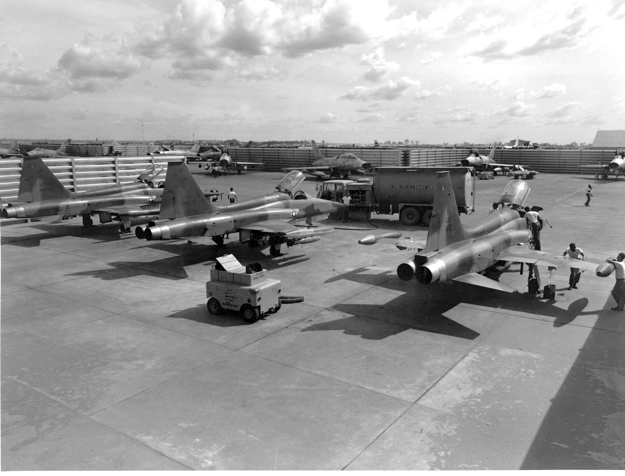 1960s -- Three F-5A aircraft, armed with 750 pound bombs, are shown in the revetment area at Bien Hoa Air Base, South Vietnam, Jan. 31, 1966.  (U.S. Air Force photo)