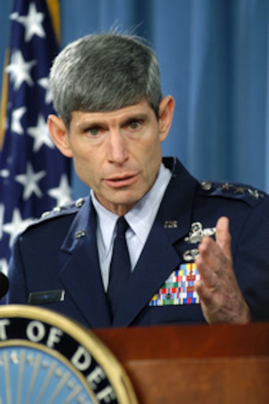 Joint Staff Director for Operations Lt. Gen. Norton Schwartz, U.S. Air Force, briefs reporters in the Pentagon, July 28, 2004, on some of the issues of interest to the decision-makers within the Department of Defense. Schwartz joined Principal Deputy Assistant Secretary of Defense for Public Affairs Lawrence Di Rita in the briefing and both men later took questions from the news media representatives. 