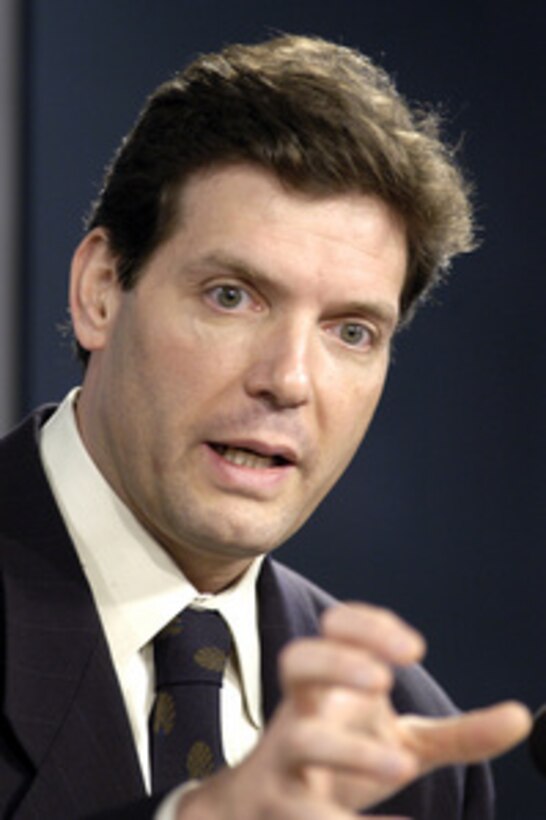 Principal Deputy Assistant Secretary of Defense for Public Affairs Lawrence Di Rita addresses an audience of journalists during a Pentagon press briefing on July 28, 2004. Joining Di Rita at the lectern was Joint Staff Director for Operations Lt. Gen. Norton Schwartz. 