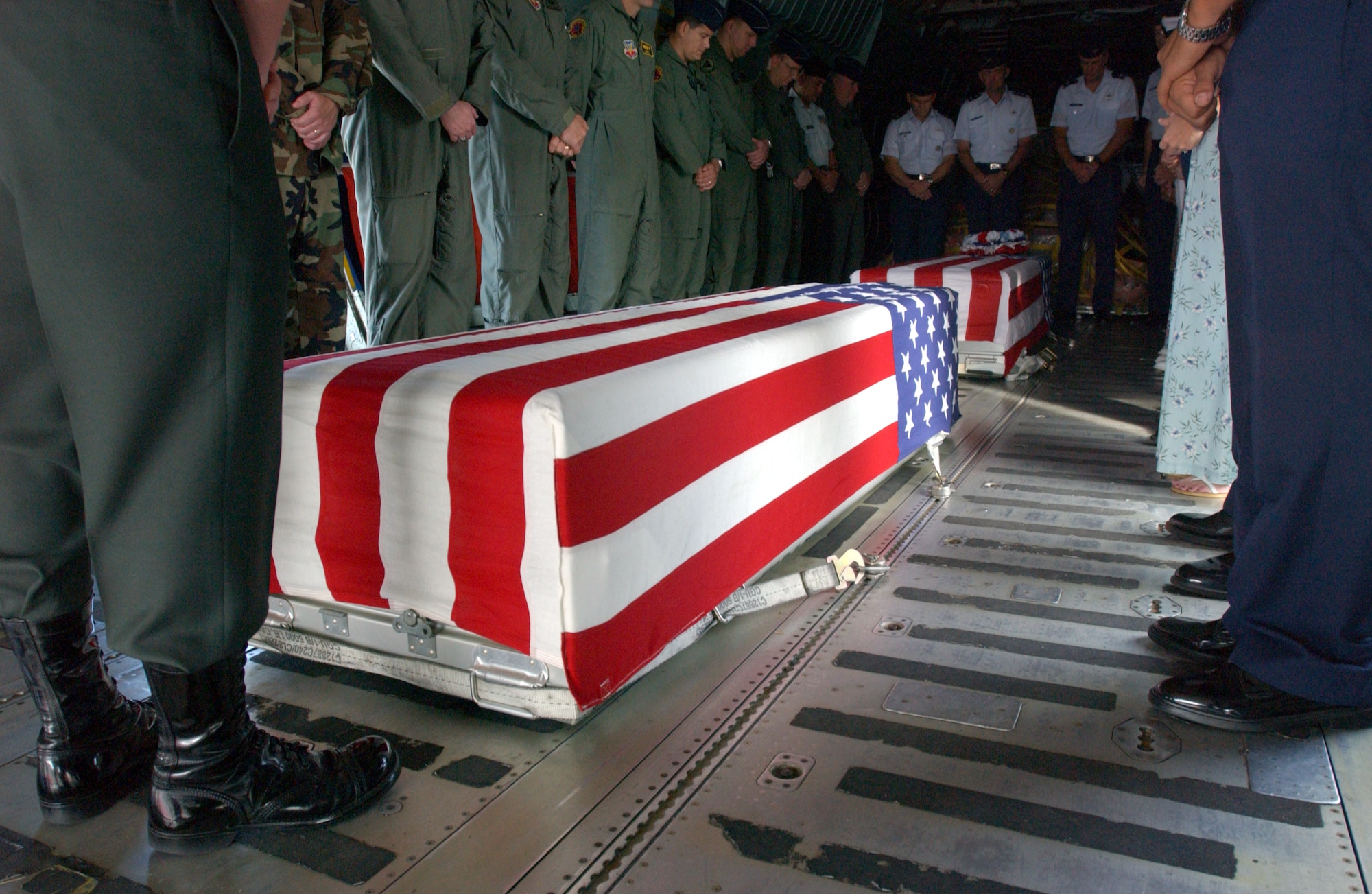 ANDERSEN AIR FORCE BASE, Guam -- People here honor two servicemembers who died during the Vietnam War.  The remains rested in the Hanoi Taxi, which became the first C-141 Starlifter to repatriate American prisoners of war from Vietnam on Feb. 12, 1973.  (U.S. Air Force photo by Master Sgt. Ken Wright) 