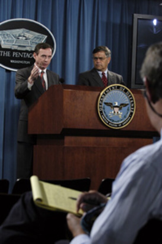 Vice President for Network Operations Management in the U.S. Postal Service Paul Vogel responds to a reporter's question during a joint press briefing with Principal Deputy Under Secretary of Defense for Personnel and Readiness Charles Abell in the Pentagon on June 2, 2004. Vogel and Abell outlined a series of initiatives intended to expedite the delivery of absentee ballots to U.S. military personnel abroad for this year's general election. 