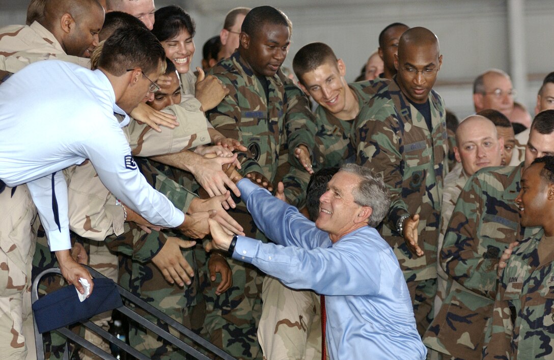 MACDILL AIR FORCE BASE, Fla. -- President George W. Bush shakes hands with servicemembers here June 16 following a speech that was broadcast live to servicemembers worldwide.  The president said with the transfer of sovereignty two weeks away, the future of a free Iraq is coming into view.  (U.S. Air Force photo by Staff Sgt. Chad Chisholm)