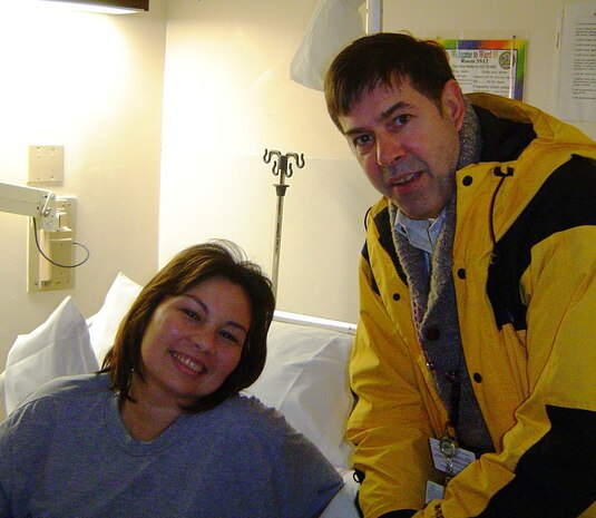 Joe Finch visits Major Tammy Duckworth at Walter Reed Army Medical Center in 2004. Duckworth is a former Army helicopter pilot whose severe combat wounds in Iraq took both her legs and damaged her right arm. She is currently the Assistant Secretary of Public and Intergovernmental Affairs for the Department of Veteran Affairs.
