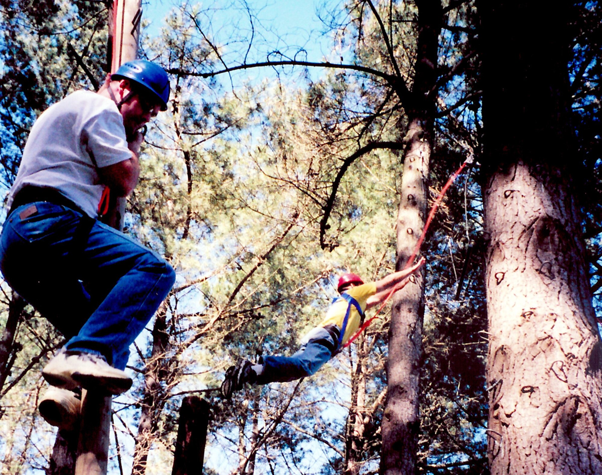 PETALUMA, Calif. -- Students at the Coast Guard Chief Petty Officer Academy here navigate the high ropes course during training.  The exercise allows students to apply what they have learned about teamwork, trust and self-confidence outside the classroom.  The academy reserves 40 slots a year for Air Force senior noncommissioned officers to attend the five-week course.  (U.S. Air Force photo by Chief Master Sgt. Brad Gildea)