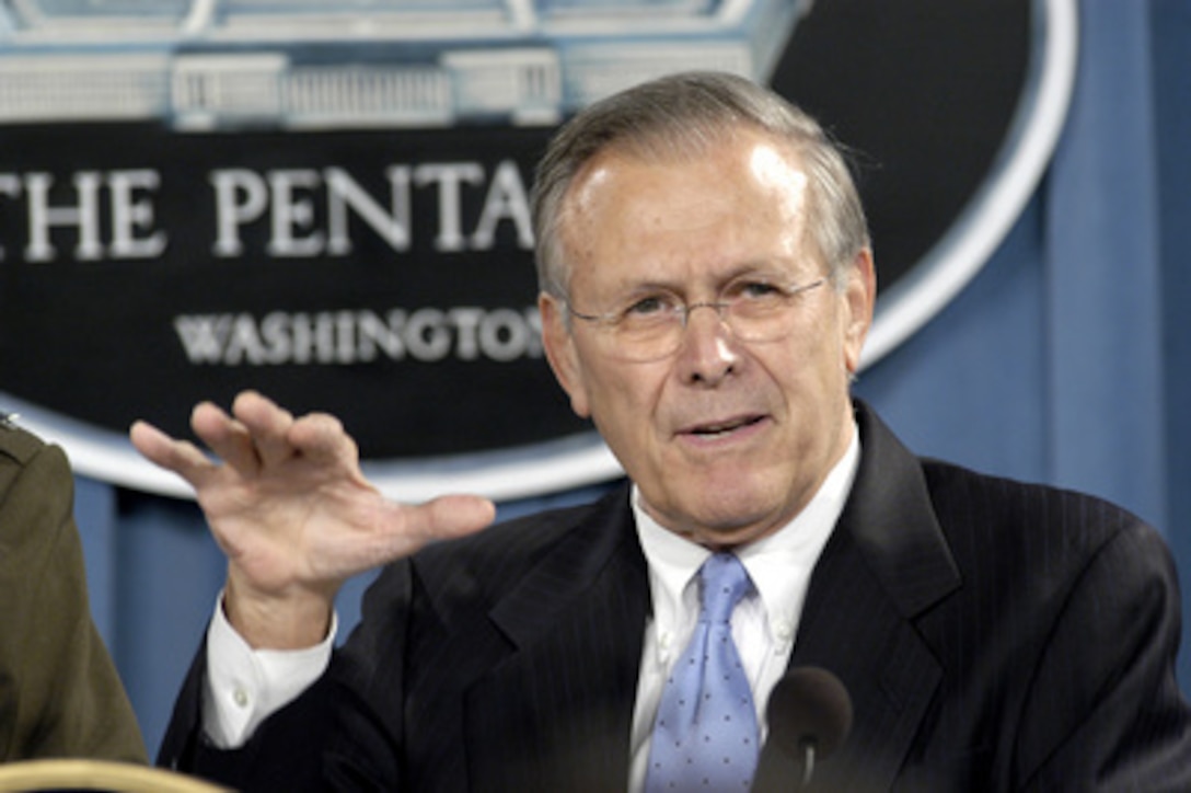 Secretary of Defense Donald H. Rumsfeld responds to a reporter's question during a press briefing in the Pentagon on June 17, 2004. Rumsfeld and Vice Chairman of the Joint Chiefs of Staff Gen. Peter Pace updated reporters on Iraq and took questions. 