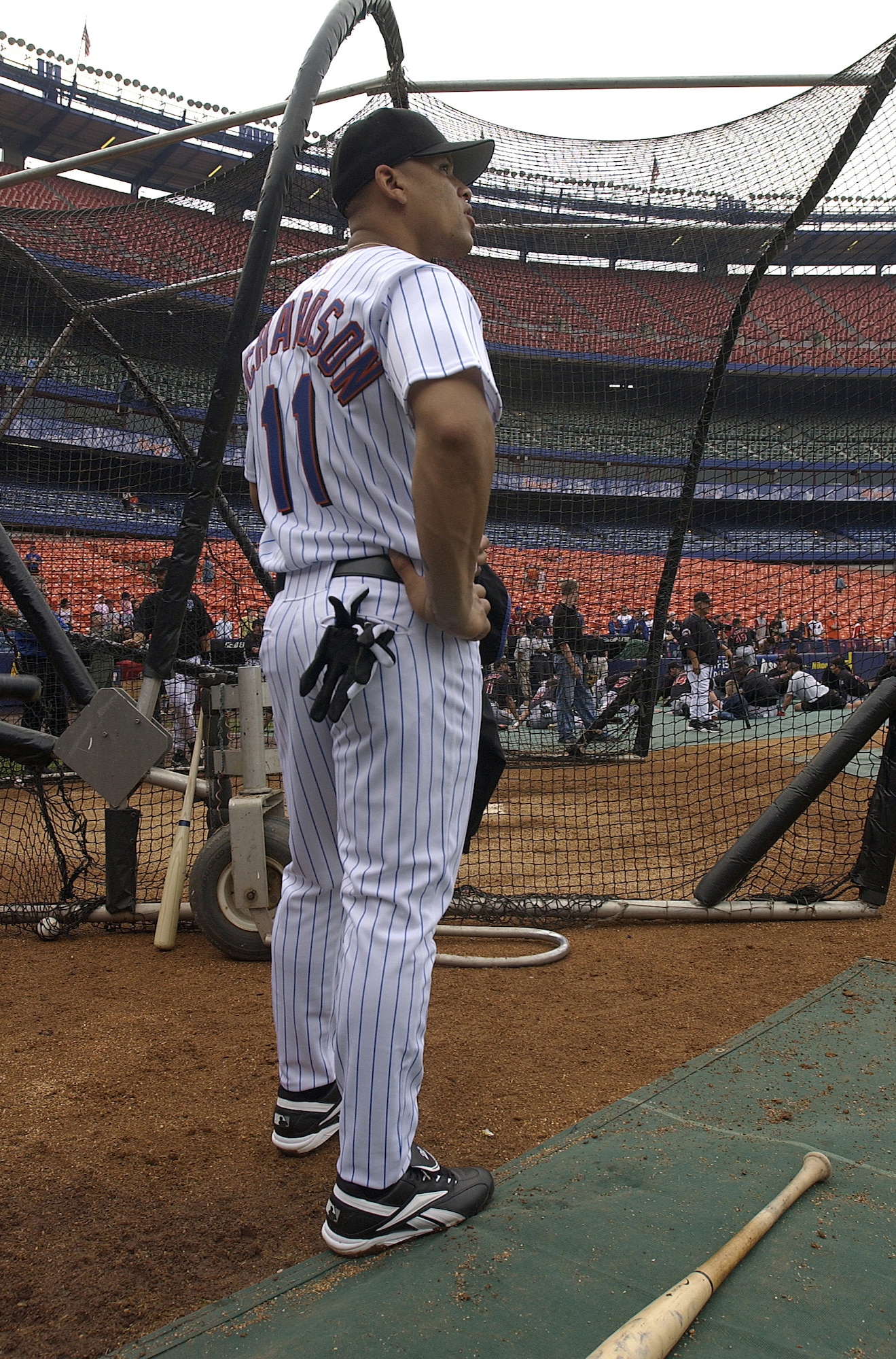 NEW YORK -- Senior Airman Chardo Richardson waits his turn for batting practice with the New York Mets on June 22.  He was at Shea Stadium for the second part of a job swap with Mets pitcher Al Leiter.  The pitcher was a boom operator for a day at McGuire Air Force Base, N.J., on May 24.  Airman Richardson is a boom operator with the 32nd Air Refueling Squadron at McGuire.  (U.S. Air Force photo by Kenn Mann)