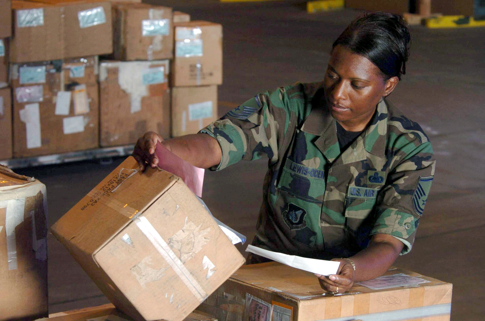 YOKOTA AIR BASE, Japan -- Master Sgt. Sonia Lewis-Oden verifies the stock numbers of equipment at the aircraft parts facility here.  She is superintendent of the 374th Logistics Readiness Squadron's aircraft parts store element here.  (U.S. Air Force photo by Master Sgt. Val Gempis)