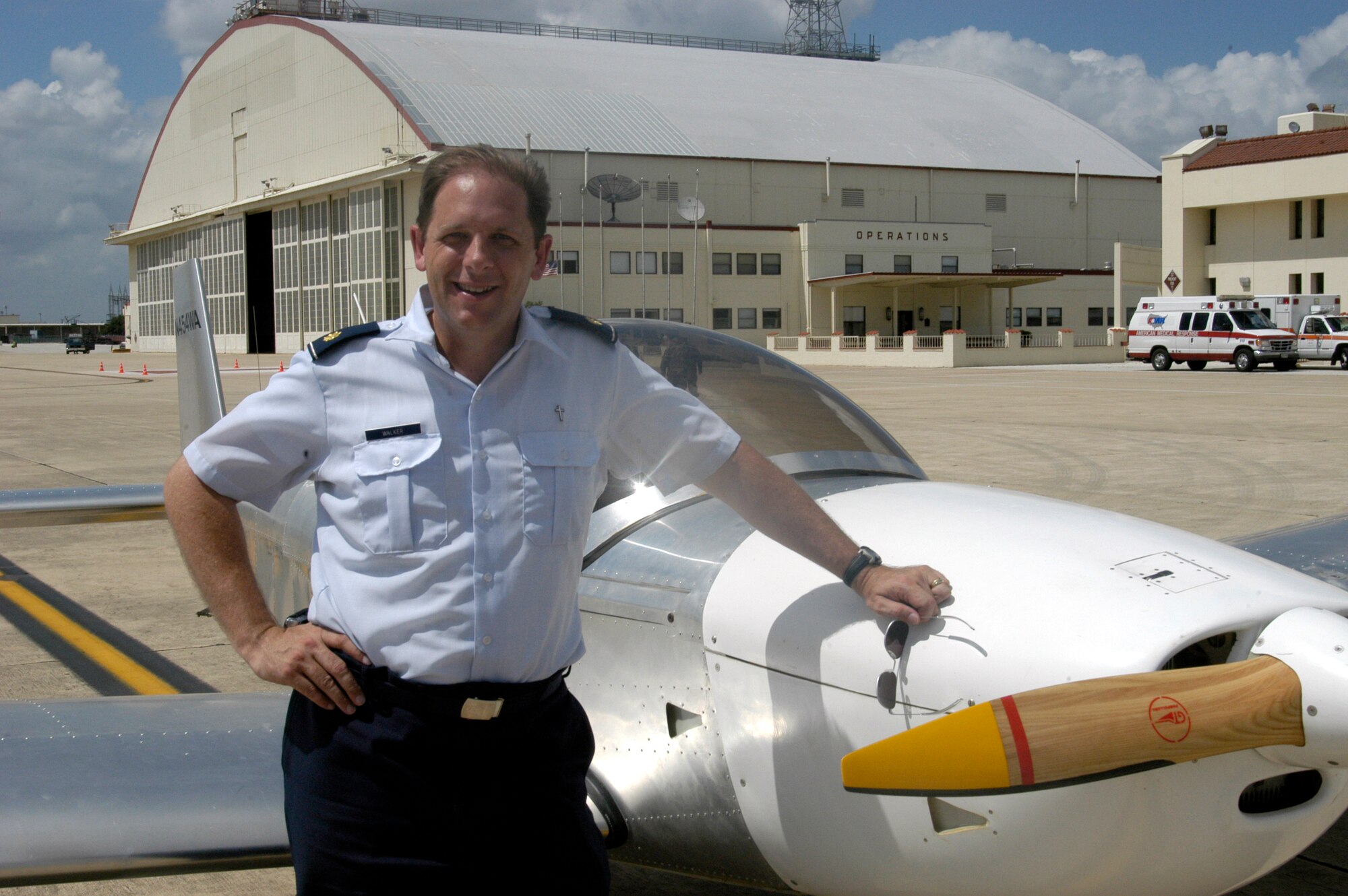 LACKLAND AIR FORCE BASE, Texas -- Chaplain (Maj.) Weston Walker stands next to his Zenith Zodiac 601 XL on the Kelly Field Annex flightline.  Chaplain Walker built the aircraft from a kit in his garage and at a hangar at a local airport.  (U.S. Air Force photo by Wayne Bryant)