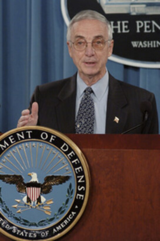 Secretary of the Navy Gordon R. England briefs reporters in the Pentagon on June 23, 2004, concerning his duties as the designated civilian official overseeing the annual administrative review of the continued detention of enemy combatants at Guantanamo Bay Naval Base, Cuba. England will operate and oversee the review process to assess whether each detainee held by the Department of Defense at Guantanamo should be released, transferred or should continue to be detained. 
