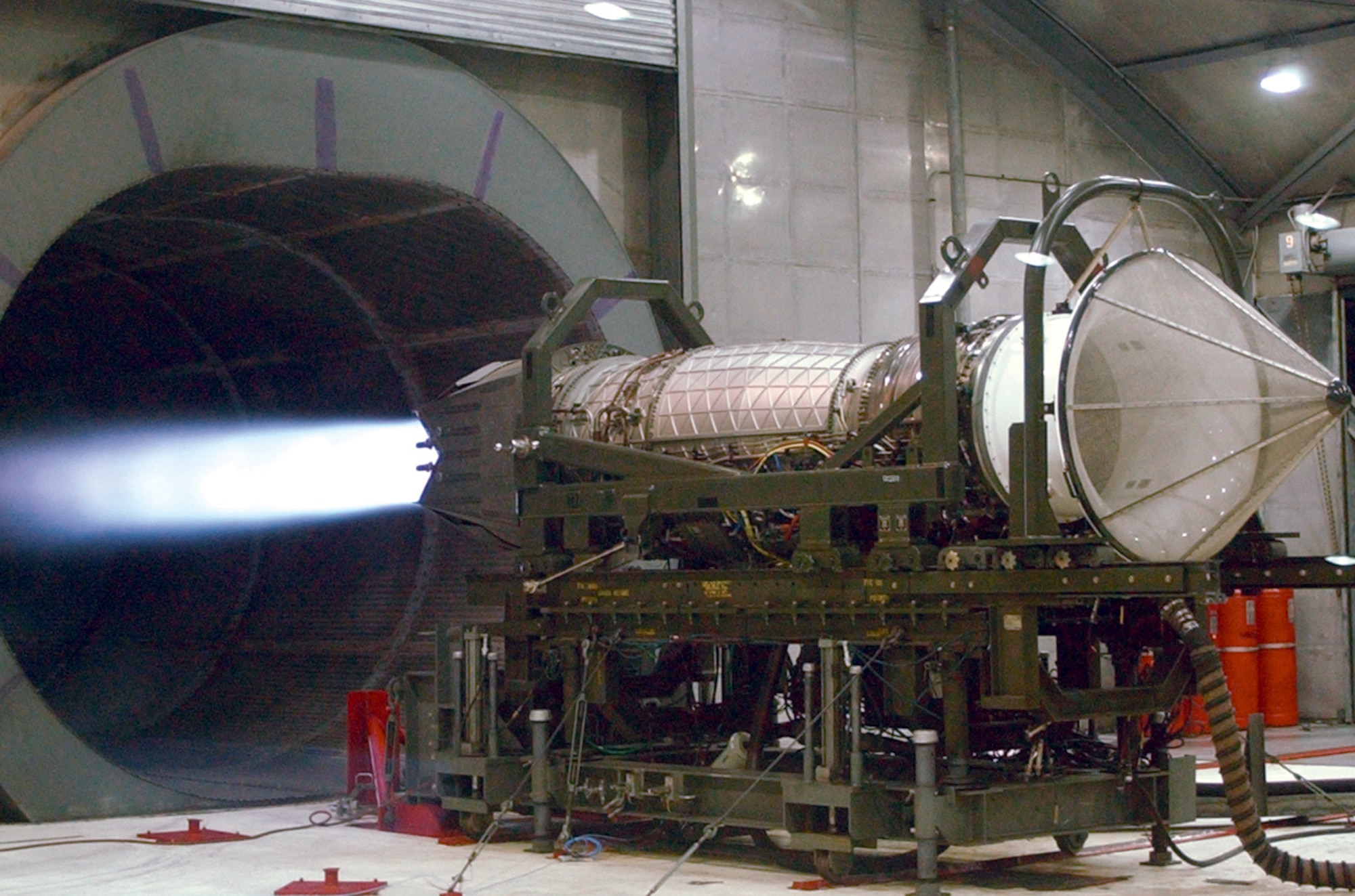 TYNDALL AIR FORCE BASE, Fla. -- A Pratt and Whitney F119 engine runs in full afterburner during an engine test in the "hush house" here.  The base is the first to receive upgrades to its engine test facilities, allowing maintainers to accommodate and test the F/A-22 Raptor's 35,000-pound thrust-class engine.  (U.S. Air Force photo by 2nd Lt. Albert Bosco)