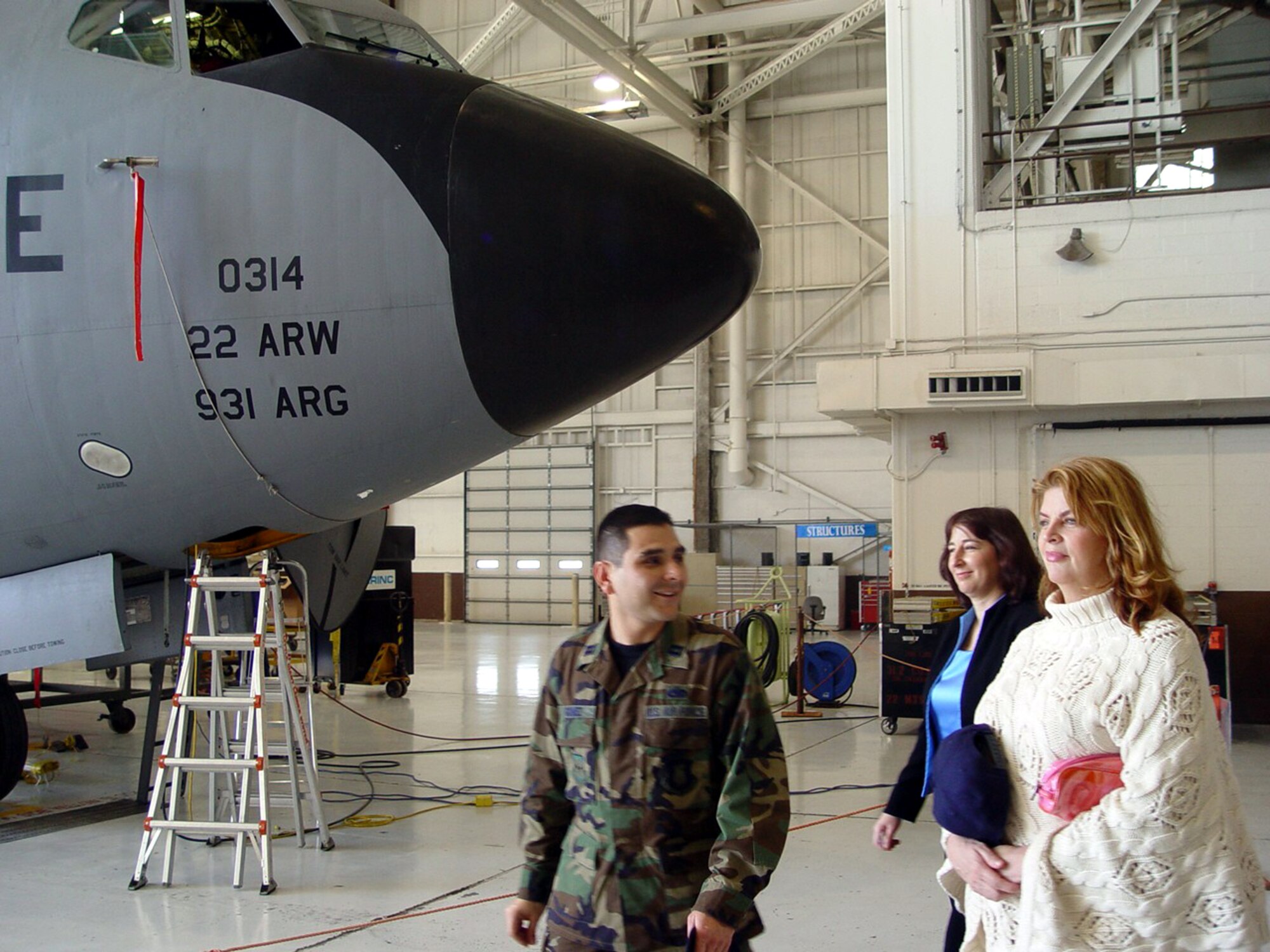 MCCONNELL AIR FORCE BASE, Kan. -- Capt. Robert Gomez gives Golden Globe-winning actress Kirstie Alley a tour of the KC-135 Stratotanker maintenance hangar.  Ms. Alley visited here March 8 to show her support for the troops.  Captain Gomez is assigned to the 22nd Maintenance Squadron here.  (U.S. Air Force photo by Airman 1st Class Harold Barnes III)