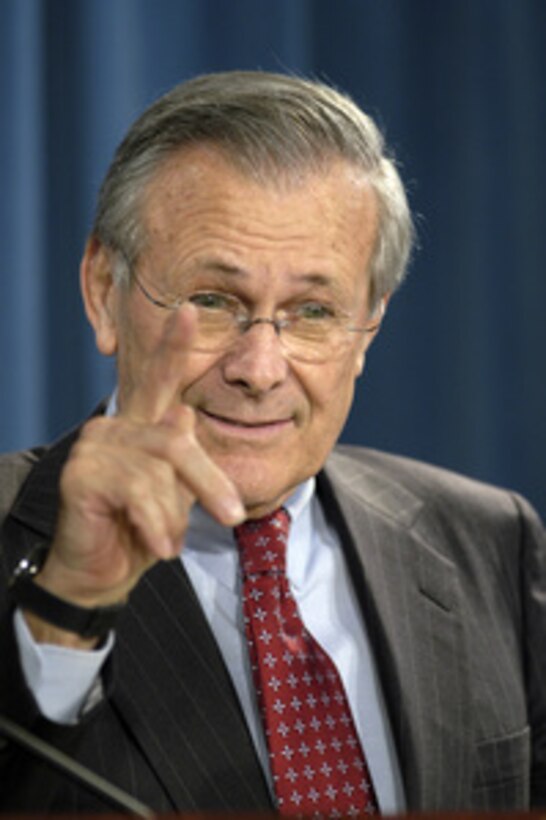 Secretary of Defense Donald H. Rumsfeld responds to a reporter's question during a press briefing in the Pentagon on March 9, 2004. 